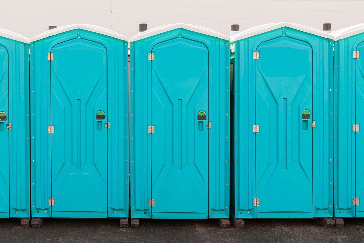 Industrial portable restroom units at a plant in Salem, New Hampshire